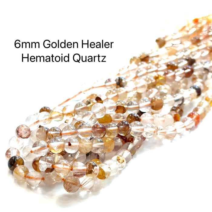 6mm Golden Healer Hematoid Quartz Strand on white center overview