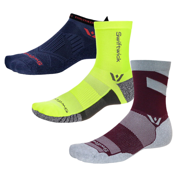 Three Swiftwick socks on a white background.