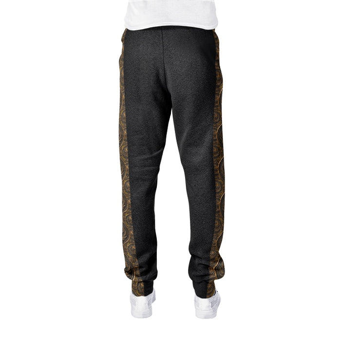 Isolated back view of dark charcoal cotton-blend joggers highlighting the seamless edge of the bronze patterned side panels and ribbed ankle cuffs.