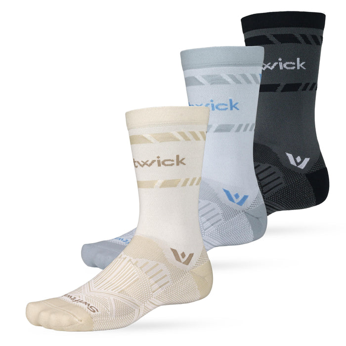 Three Swiftwick performance crew socks in beige, light blue, and dark gray, staggered view showing logo and cushioning