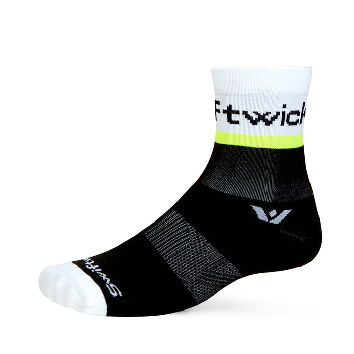 Aspire Mid-Crew sock in black and white with a hi-viz yellow stripe