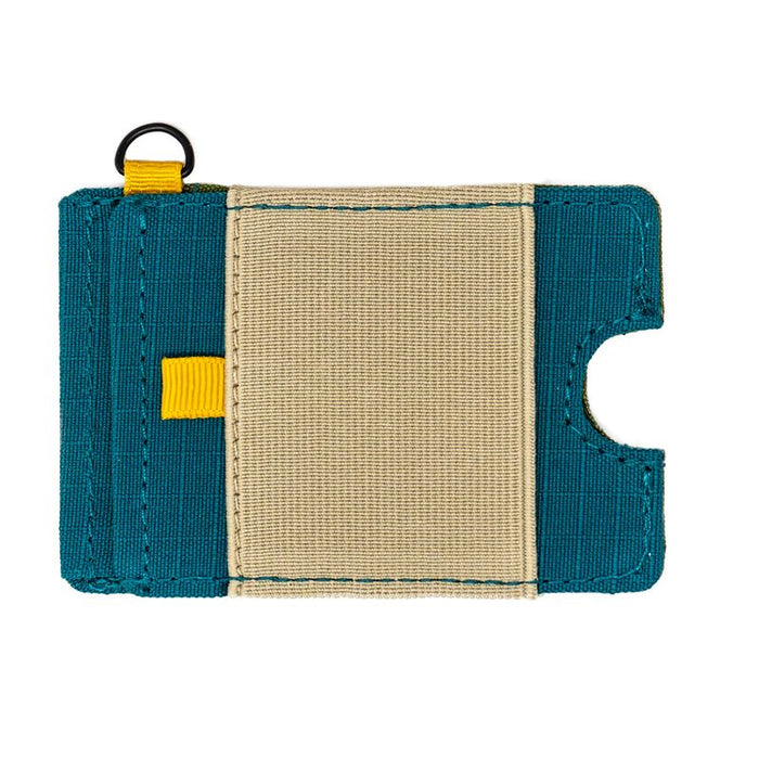 Low-profile, minimalist front pocket wallet    Push-up thumb notch for quick card access Dual elastic bands for stashing cash Made from durable ripstop canvas Includes RFID-blocking card Max Capacity 5-7 cards Dimensions 2.65” x 3.75”