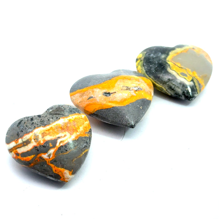 Bumblebee Jasper Heart Gemstone grouping on white overview