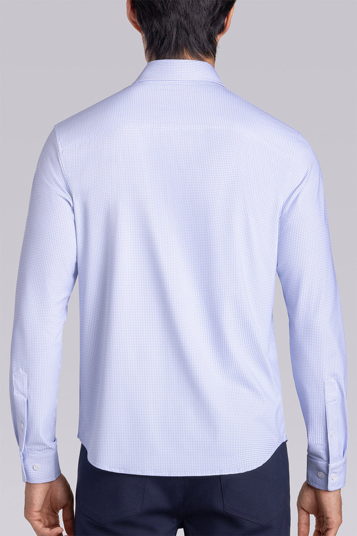 Model wearing the Captivate White Blue long sleeve dress shirt, styled with fitted black dress slacks.