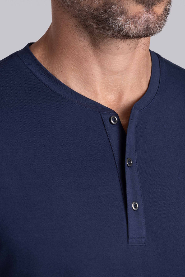 Model wearing Cardinal Legion Blue Icy Bamboo® soft short sleeve shirt, styled with white shirts.