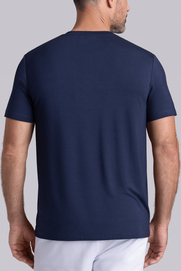 Model wearing Cardinal Legion Blue Icy Bamboo® soft short sleeve shirt, styled with white shirts.