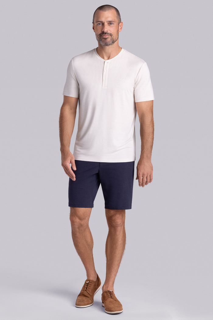 Model wearing Cardinal Natural White Heather Icy Bamboo® soft short sleeve shirt, styled with white shirts.