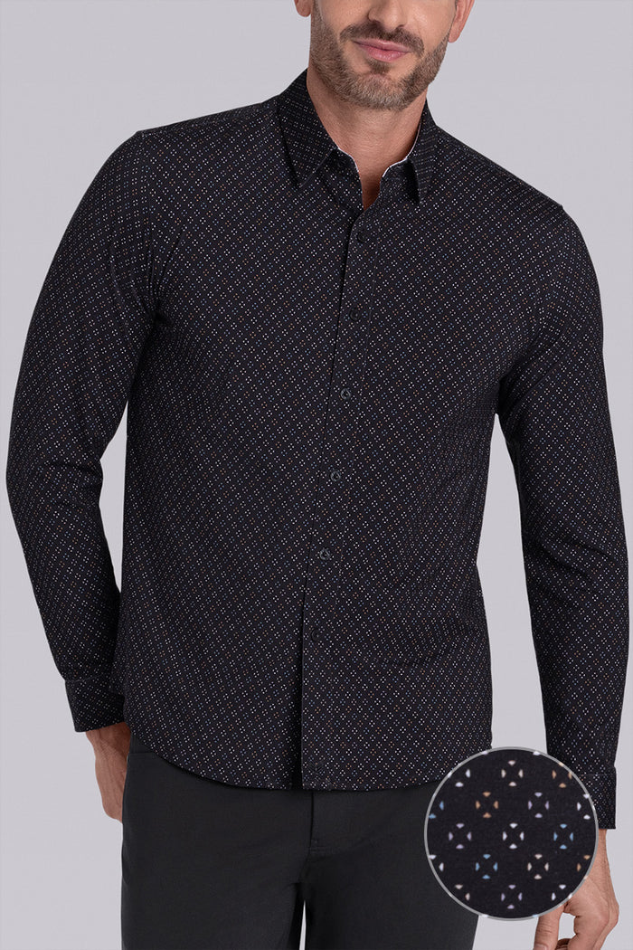 Model wearing the Cerebral Black long sleeve dress shirt, styled with fitted black dress slacks.