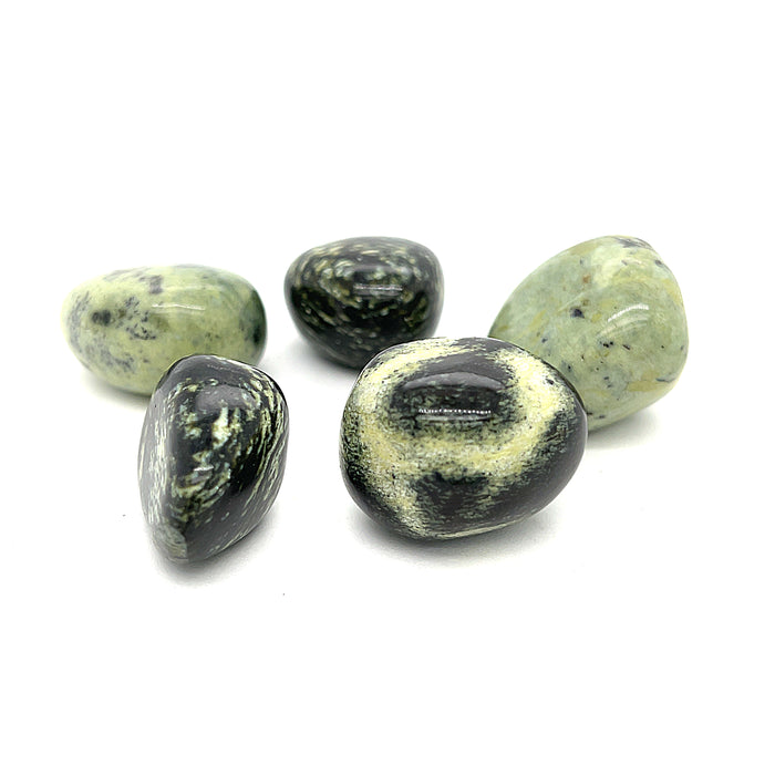 A collection of tumbled Chytha gemstones with a greenish hue, displayed on a white background, front overview.