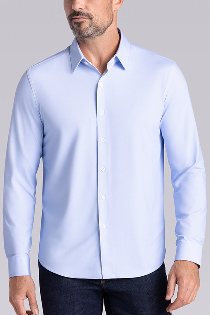 Model wearing the Crowd Pleaser Light Blue long sleeve shirt, styled with black pants.