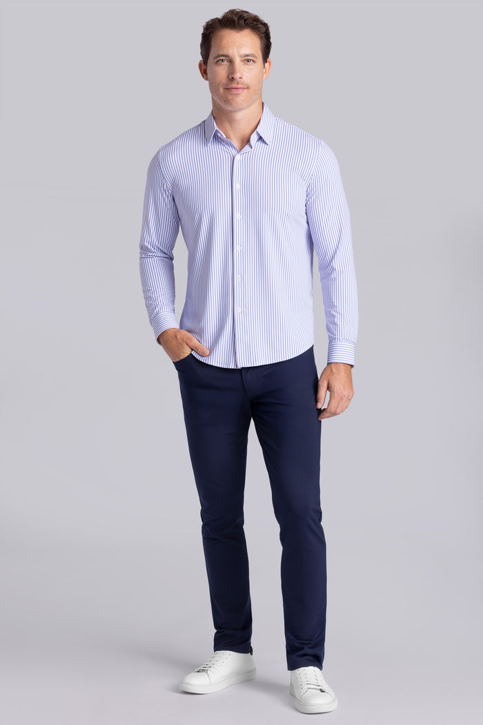 Model wearing the Crowd Pleaser White Blue long sleeve shirt, styled with black pants.