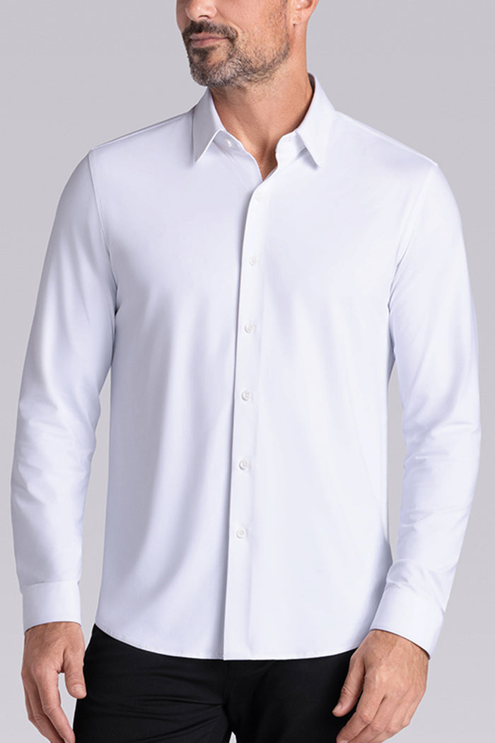Model wearing the Crowd Pleaser White long sleeve shirt, styled with black pants.