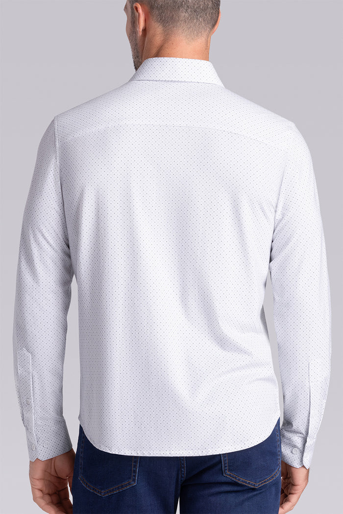 Model wearing the Dignity White long sleeve shirt, styled with black pants.