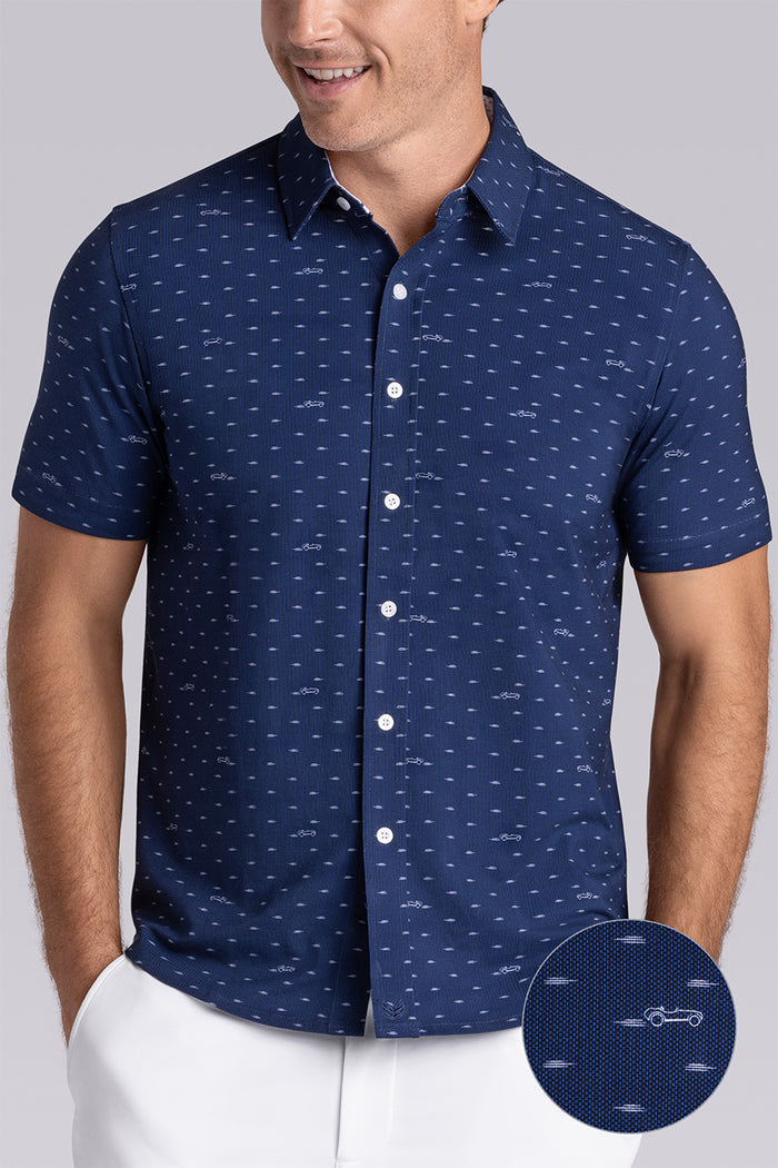 Model wearing Drift Dark Navy short sleeve car print shirt, styled with white shorts