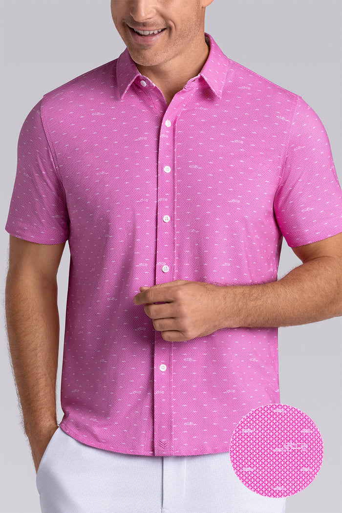 Model wearing Drift Fuchsia Red short sleeve car print shirt, styled with white shorts