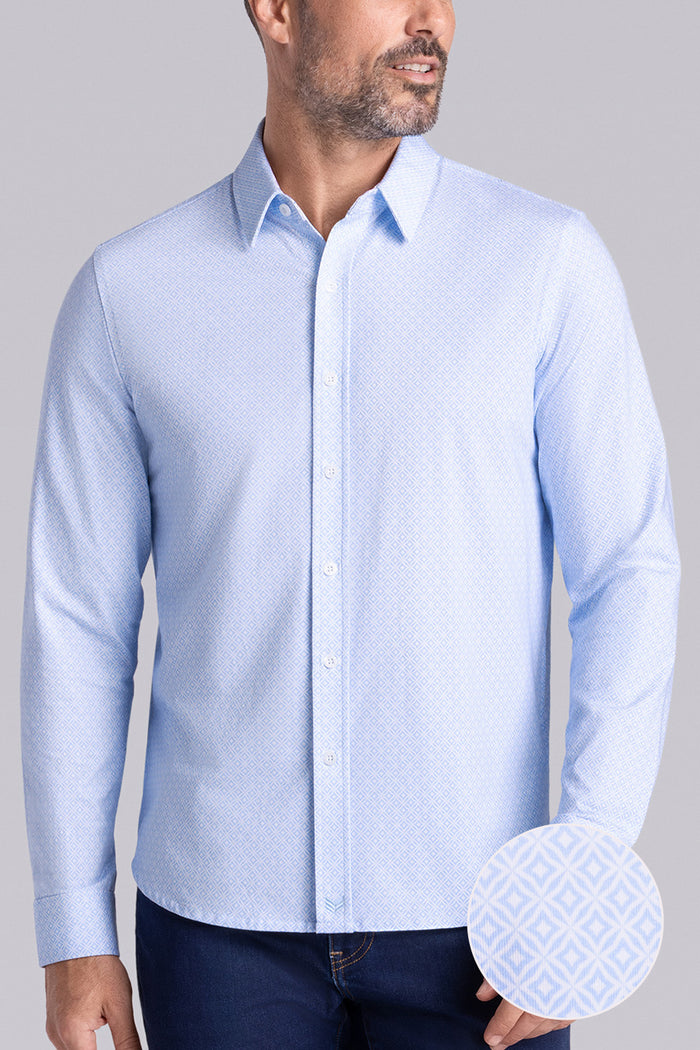 Model wearing Echo Haze Blue long sleeve tonal geometric print shirt, styled with black pants.