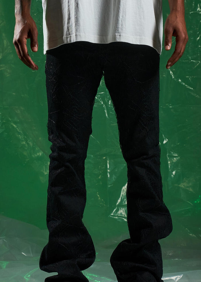 Embellish Spider Flare Black Denim Jeans with Distressed Details and Embellishments