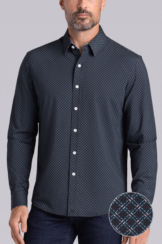 Model wearing Empower Black Green long sleeve dress shirt, styled black pants.