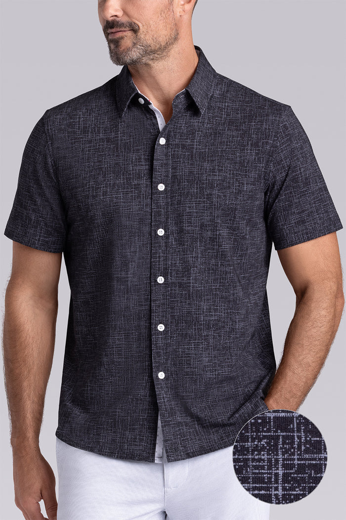 Model wearing Encore Black short sleeve classic collar shirt, style with white shorts