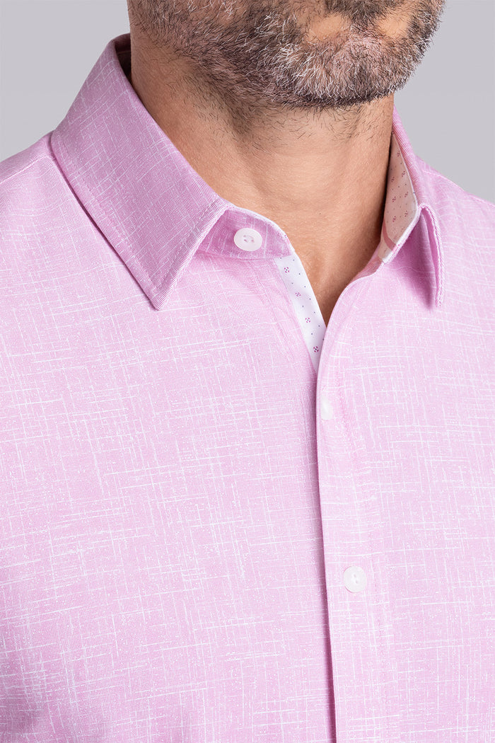 Model wearing Encore Light Pink short sleeve classic collar shirt, style with black shorts