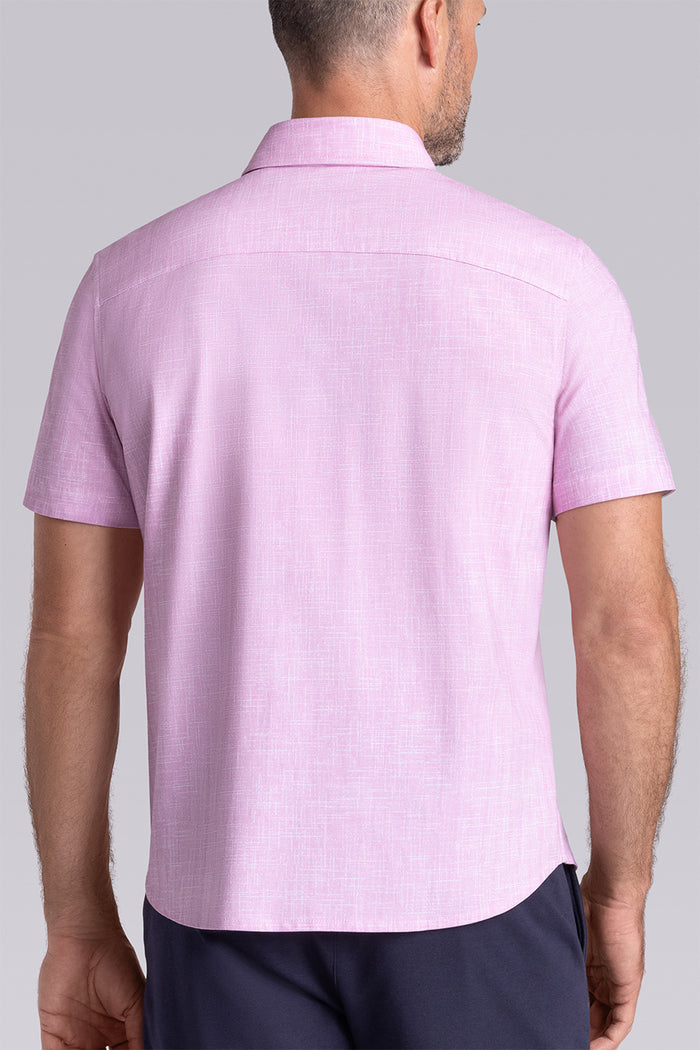 Model wearing Encore Light Pink short sleeve classic collar shirt, style with black shorts