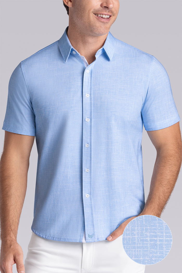 Model wearing Encore Ocean Blue short sleeve classic collar shirt, style with white pants