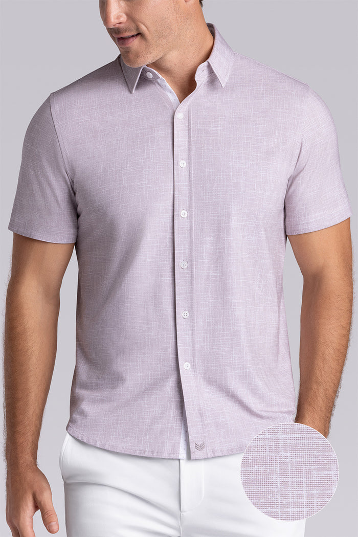 Model wearing Encore Sand short sleeve classic collar shirt, style with white shorts