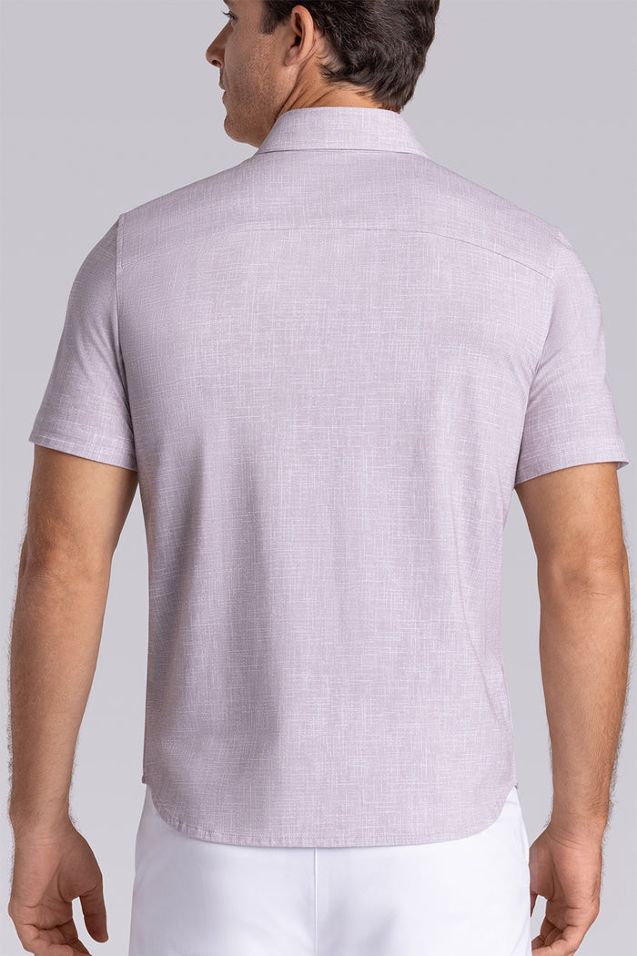 Model wearing Encore Sand short sleeve classic collar shirt, style with white shorts