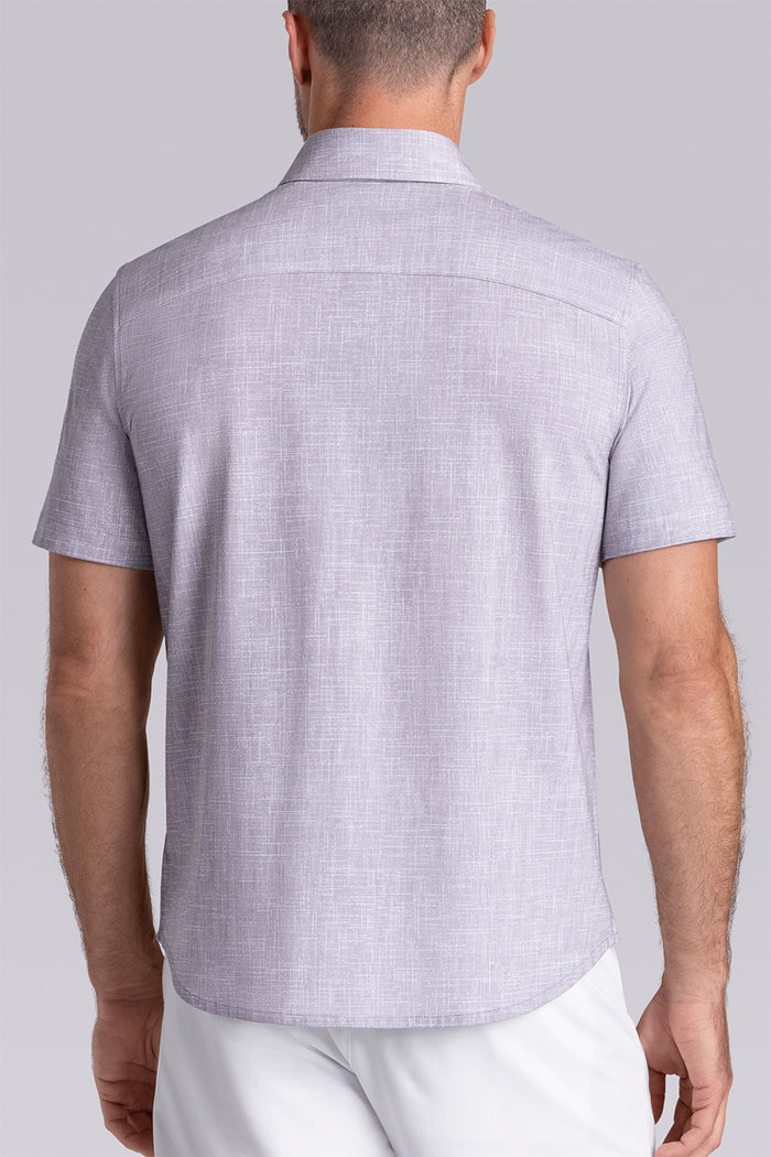 Model wearing Encore Taupe short sleeve classic collar shirt, style with white shorts