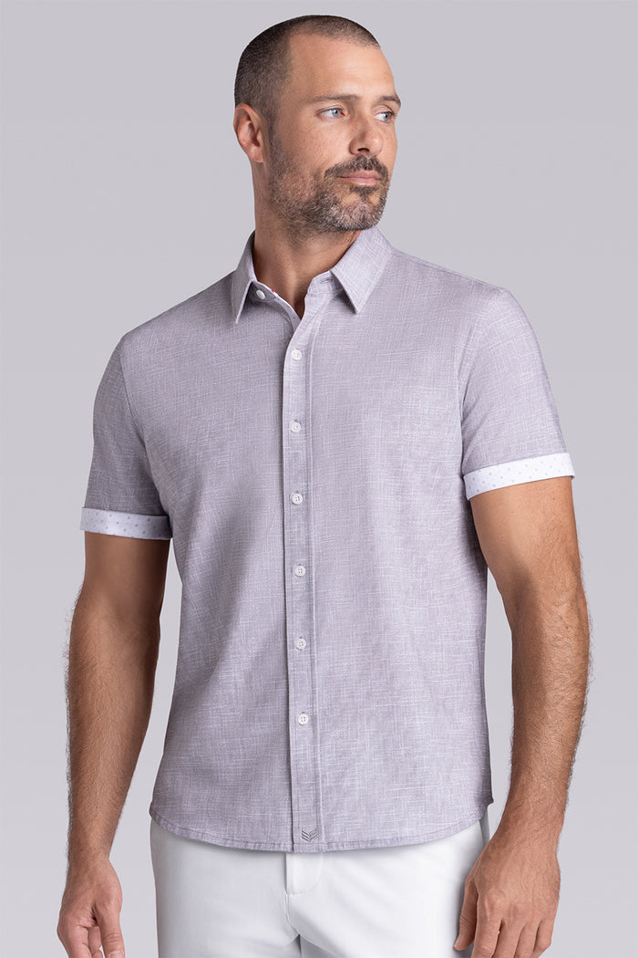 Model wearing Encore Taupe short sleeve classic collar shirt, style with white shorts