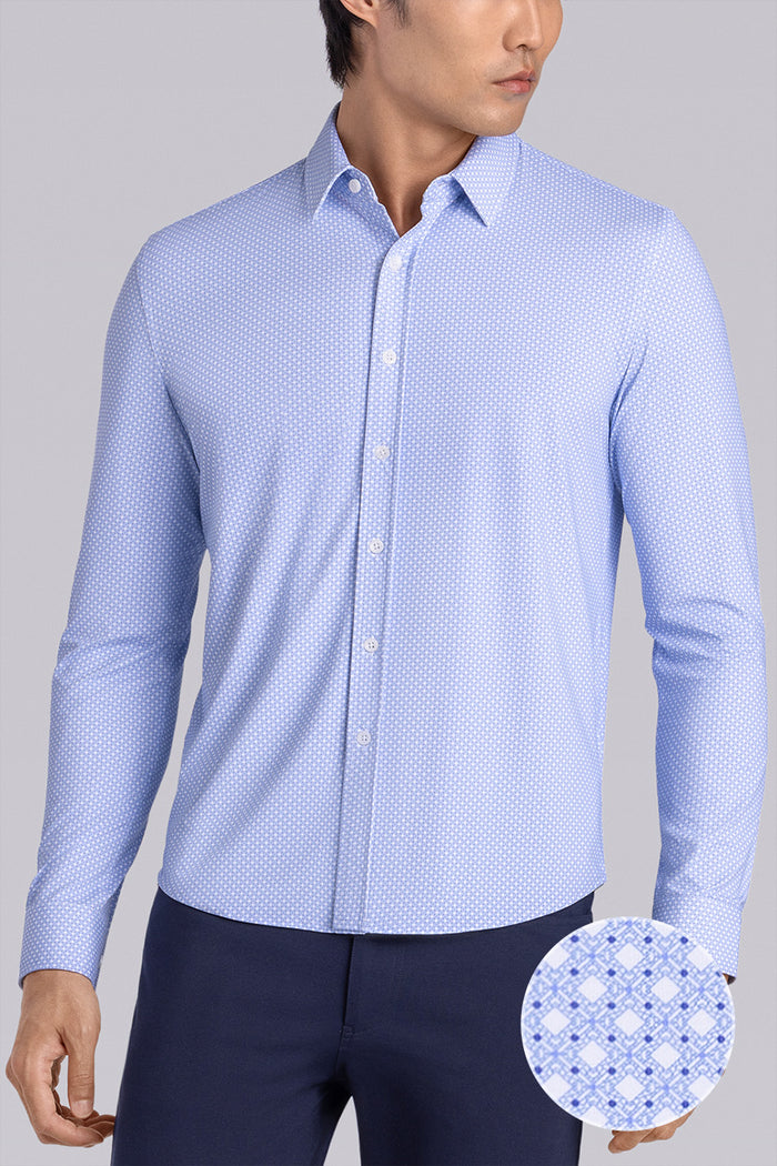 Model wearing the Ethereal Blue long sleeve dress shirt, styled with fitted black dress slacks.