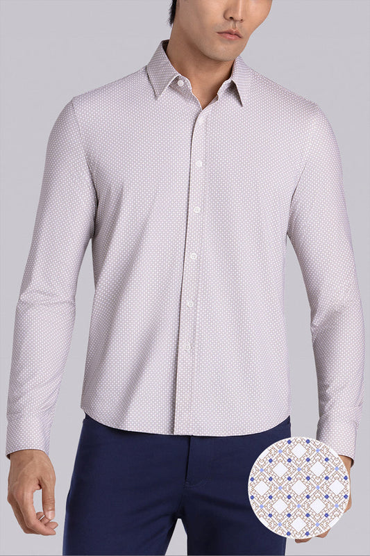 Model wearing the Elusive Sand long sleeve dress shirt, styled with fitted black dress slacks.