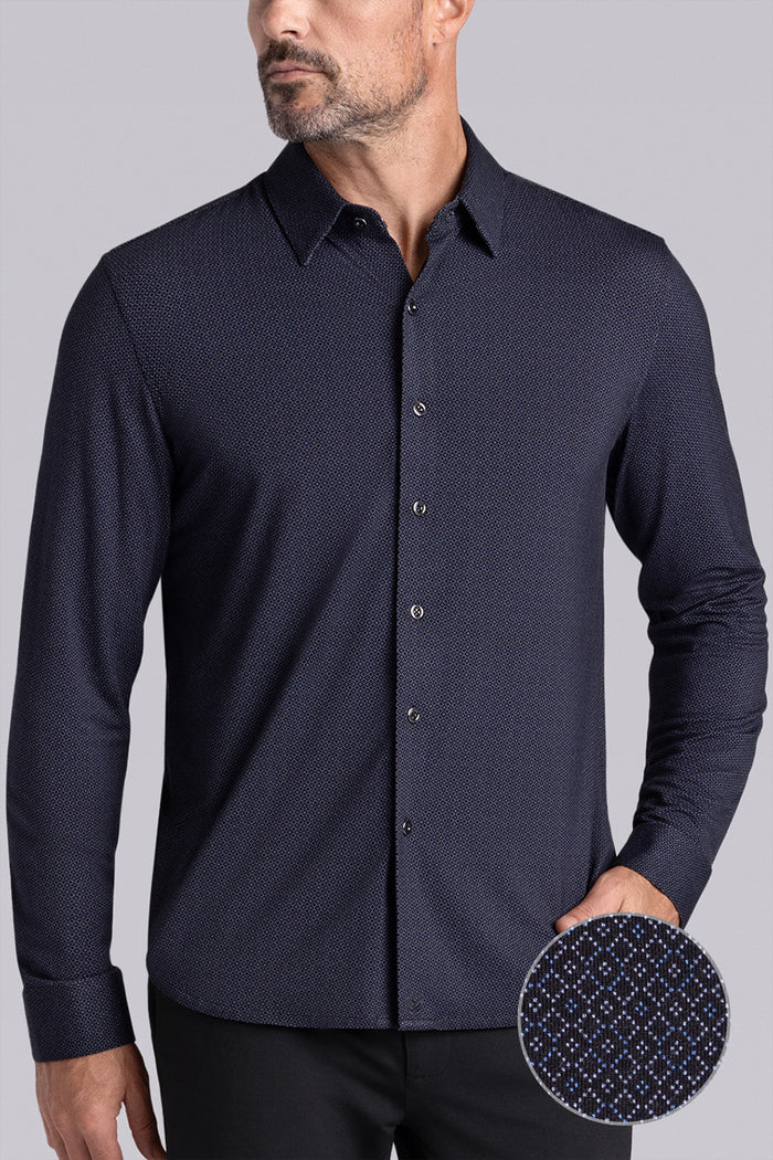 Model wearing the Excelsior Black Ink long sleeve dress shirt, styled with fitted black dress slacks.