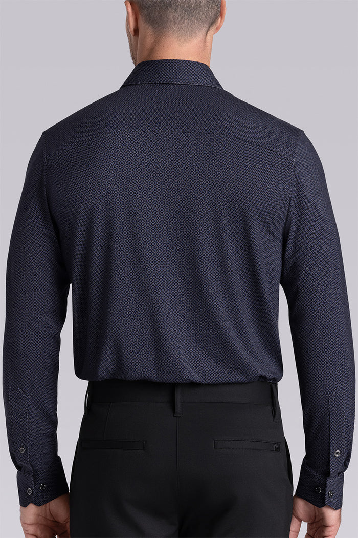 Model wearing the Excelsior Black Ink long sleeve dress shirt, styled with fitted black dress slacks.