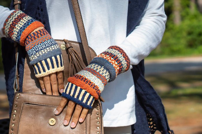 Adult Fingerless Mittens with colorful knit patterns outdoors