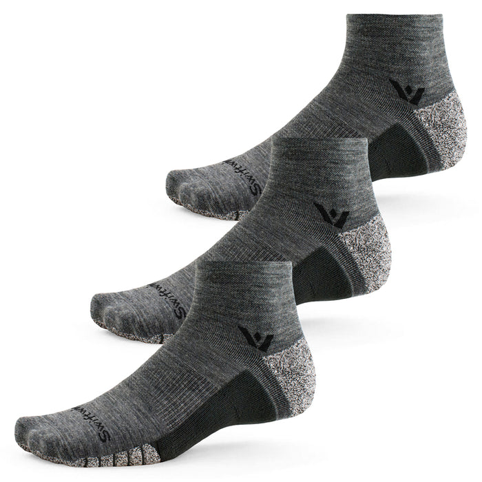 Three pairs of Flite XT Trail Quarter Crew socks in heather gray