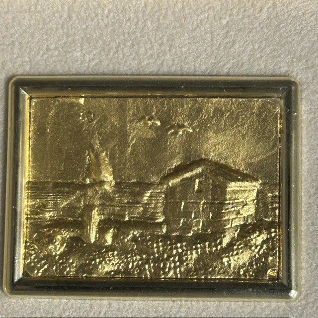 Gold Relief in Wooden Frame