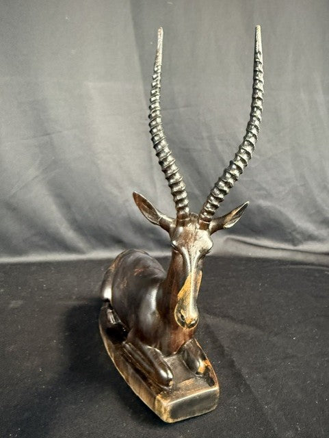 Hand-Carved Gazelle Sculpture.