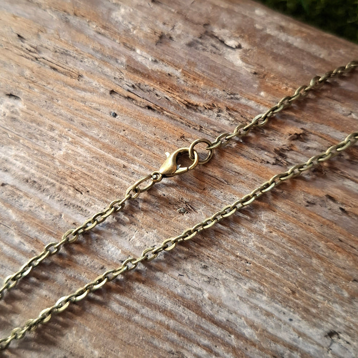 Handmade Swords and Roses Storybook Pendant
