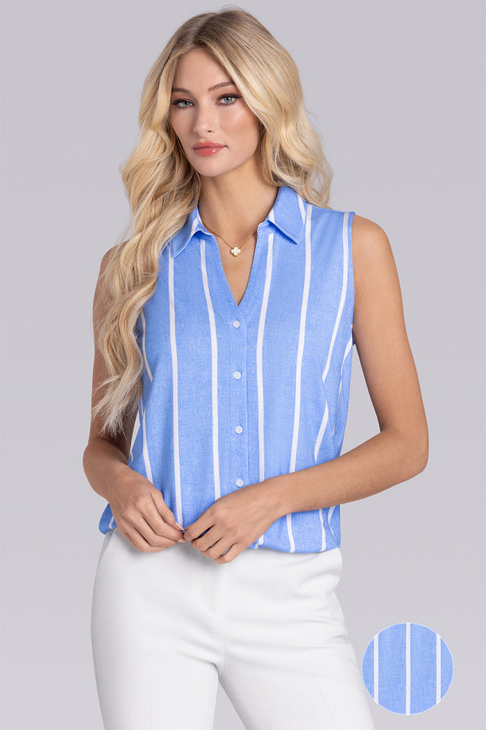 Model wearing Harmony Airy Blue Icy Bamboo® sleeveless v-neck shirt, styled with white pants.