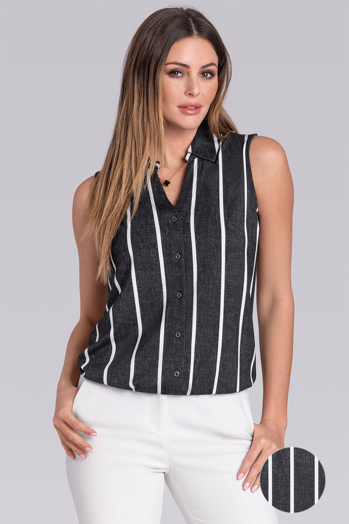 Model wearing Harmony Black White Icy Bamboo® sleeveless v-neck shirt, styled with white pants.