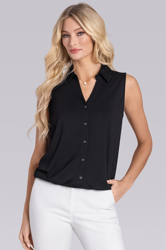 Model wearing Harmony Black Icy Bamboo® sleeveless v-neck shirt, styled with white pants.