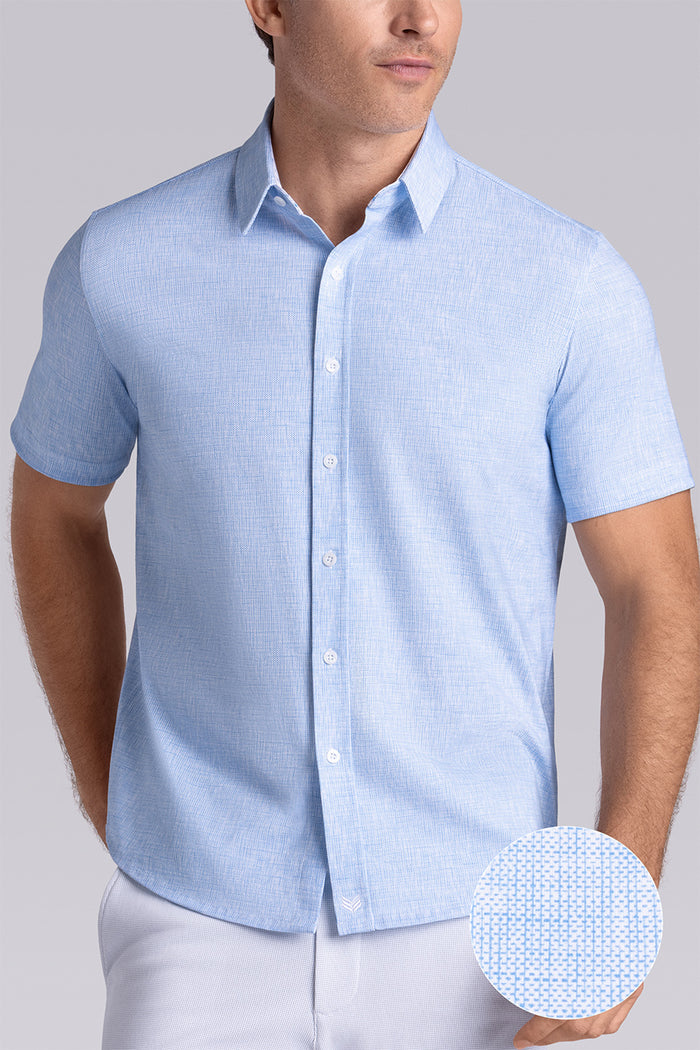 Model wearing Horizon Haze Blue Icy Cotton® short sleeve shirt classic collar, styled with white shorts