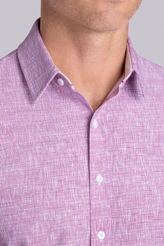Model wearing Horizon Magenta Icy Cotton® short sleeve shirt classic collar, styled with white shorts