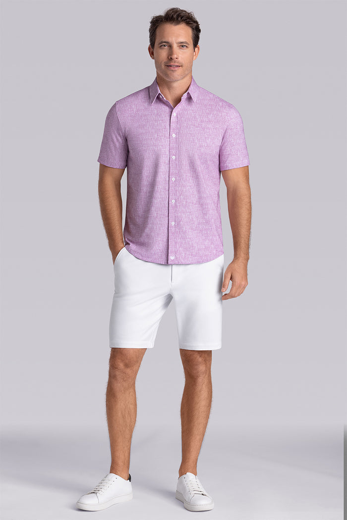 Model wearing Horizon Magenta Icy Cotton® short sleeve shirt classic collar, styled with white shorts