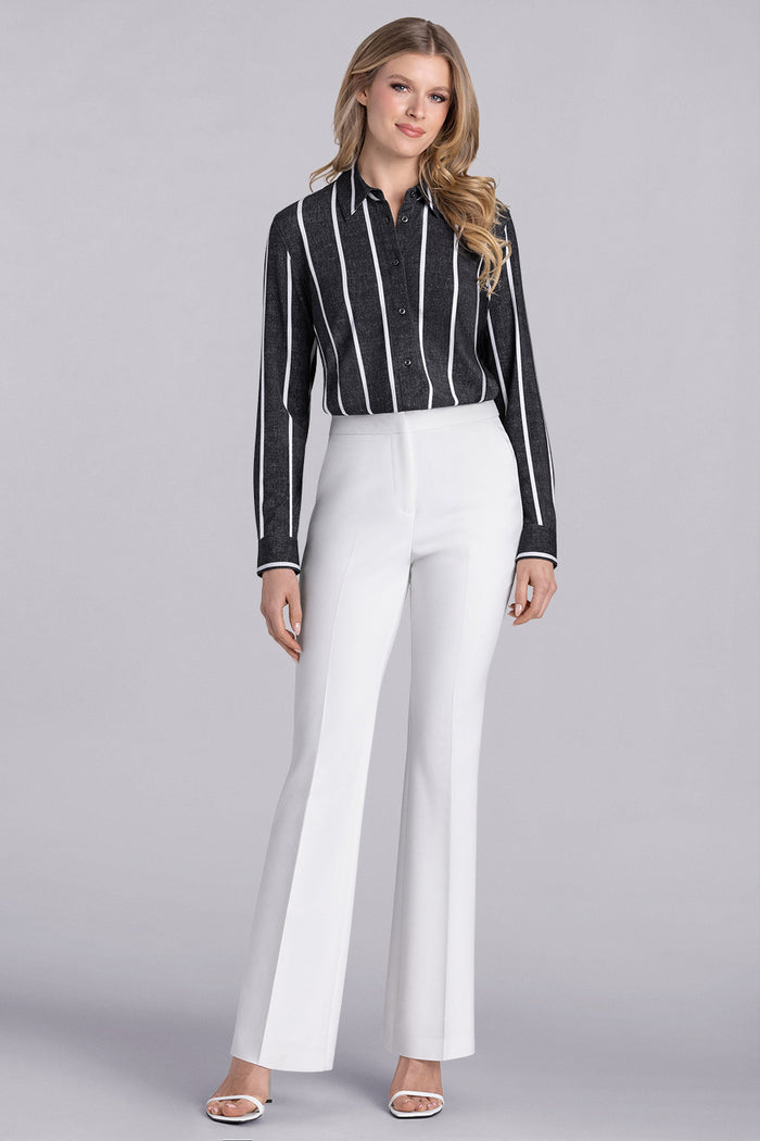 Model wearing Icon Black White Icy Bamboo® long sleeve classic collar shirt, styled with white pants.