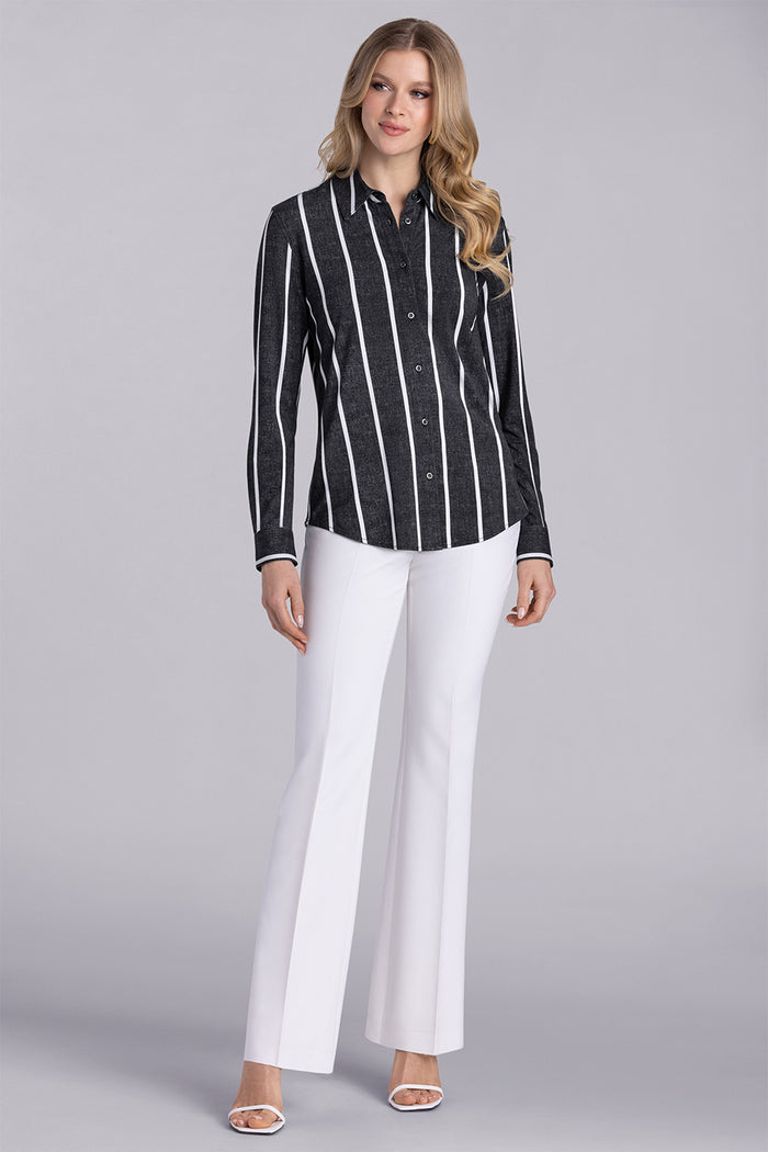 Model wearing Icon Black White Icy Bamboo® long sleeve classic collar shirt, styled with white pants.