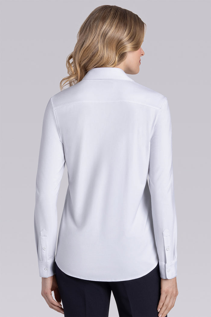 Model wearing Icon White Icy Bamboo® long sleeve classic collar shirt, styled with black pants.