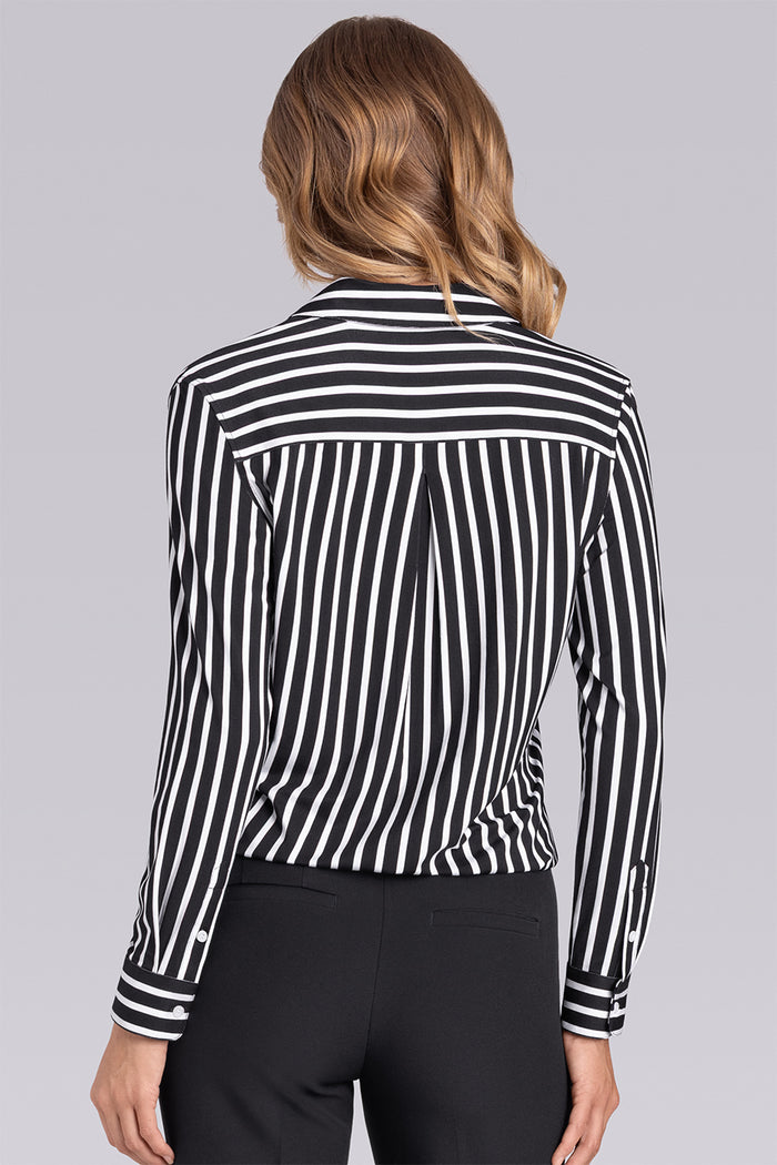 Model wearing Idol Black White Icy Bamboo® long sleeve classic collar shirt, styled with black pants.