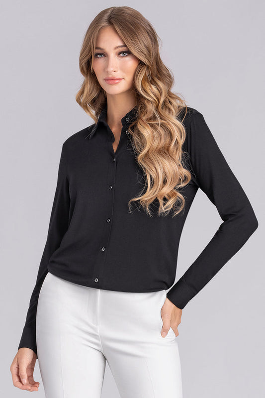 Model wearing Idol Black Icy Bamboo® long sleeve classic collar shirt, styled with white pants.